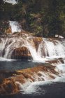 Waterfall splashing in jungle, Chiapas, Mexico — Stock Photo