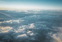 View of white clouds in blue sky from above — Stock Photo