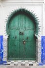 Typical arabic entrance doors with arch, Morocco — Stock Photo