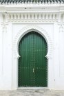 Typical arabic entrance green doors, Morocco — Stock Photo