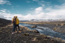 Travelers standing on valley — Stock Photo