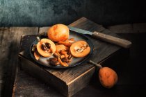 Fresh loquats in plate — Stock Photo