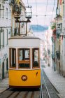Tram on narrow old street — Stock Photo