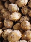 Close-up of fresh picked potatoes in heap — Stock Photo