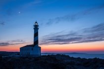Coucher de soleil au phare de Favaritx, Minorque, Espagne — Photo de stock