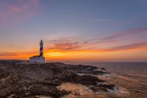 Pôr do sol no Farol Favaritx, Menorca, Espanha — Fotografia de Stock