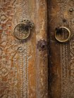 Old wooden door with a lock — Stock Photo