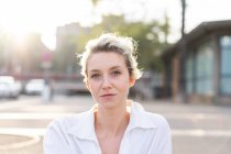 Blonde woman portrait looking at the camera — Stock Photo