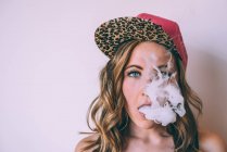 Skater woman smoking a cannabis joint — Stock Photo