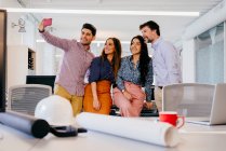 Office employees taking selfie — Stock Photo