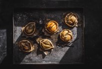 Baking pan with apple mini galettes — Stock Photo
