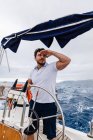 Captain of a ship sailing on a sailboat — Stock Photo