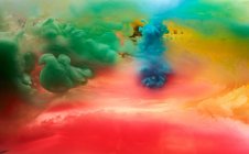 Sfondo di nuvole di fumo colorate vivide — Foto stock