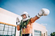Poses outside together gym with astronaut helmet. — Stock Photo