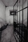 Grungy concrete wall inside prison cell in Oviedo, Spain — Stock Photo