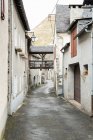 Panoramic view of ancient town near high hills and cloudy in Pyrenees — Stock Photo