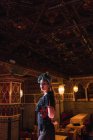 Young woman in dress dancing flamenco on scene in luxury oriental room decorated by mosaic — Stock Photo
