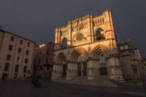 Exterior of beautiful medieval cathedral on square in light of early morning sun — Stock Photo