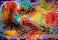 Flujo abstracto de pinturas líquidas en mezcla - foto de stock