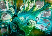 Абстрактный поток жидких красок в смеси — стоковое фото