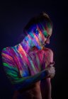 Modelo de topless em luzes de néon — Fotografia de Stock