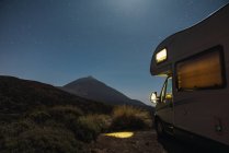 View of camper van on mountain Teide and sky with stars at night in Tenerife, Canary Islands, Spain — Stock Photo