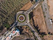 Aerial top view of roadway with circle in countryside of Gran Canaria island, Spain — Stock Photo