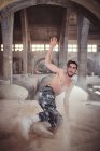 Male b-boy dancing in old building — Stock Photo