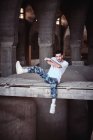 Male b-boy making dancing move in old building — Stock Photo