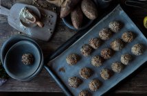 Set of sweet potatoes in sesame seeds on table — Stock Photo