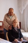 Portrait of an elderly couple in their home interior — Stock Photo