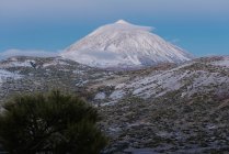 View of snowy mountain peak against blue sky at dusk on Canary Islands, Spain — Stock Photo