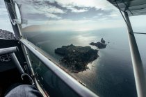 Aerial view of islands from inside of a small plane — Stock Photo