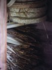Conjunto de rollos de fibra de palma seca tejida en taller — Stock Photo