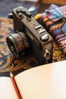 Vintage camera on a decorative table — Stock Photo
