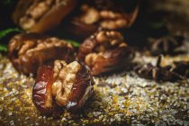Closeup of halal snack for Ramadan with dried dates and walnuts — Stock Photo