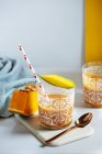 Mango and pumpkin smoothie glasses on white background — Stock Photo