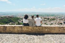 Group of friends doing tourism in Spain and contemplating the panoramic views of the Alhambra in Granada — Stock Photo