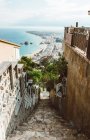 Narrow path stairs on street and seascape landscape — Stock Photo