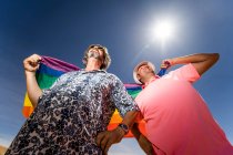 Excited plump gay couple in desert — Stock Photo