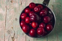 Top view of Saucepan with cherries — Stock Photo