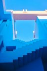 Geometric staircase up in passage of building — Stock Photo