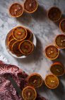 Sliced blood oranges on white marble table — Stock Photo