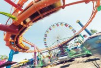 Details of colorful moving attraction at summer carnival on sunny day in USA — Stock Photo