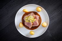 Duroc sirloin with orange ginger soy and potatoes — Stock Photo