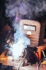Professional welder in mask welding metal — Stock Photo
