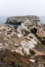 Rocky formations in the island of Baleal on the Atlantic coast in a foggy day. Peniche, Portugal — Stock Photo