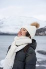 Joyful young woman in warm clothes — Stock Photo