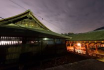 Illuminated shrine in summer evening — Stock Photo