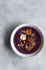 Top view of delicious acai smoothie bowl with granola and fresh berries served for healthy breakfast on marble table — Stock Photo